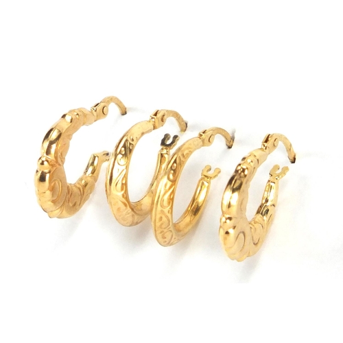 2276 - Two pairs of 9ct gold hoop earrings, the largest 1.3cm in diameter, approximate weight 2.0g