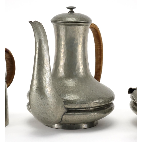 344 - Tudric pewter coffee pot, teapot and jug, each with impressed marks and numbered to the bases, the l... 
