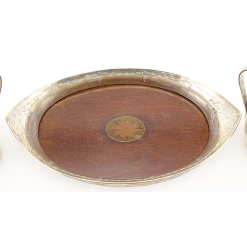 2244 - Silver three piece cabaret set, engraved with swags and bows, various Chester hallmarks, the tray 20... 