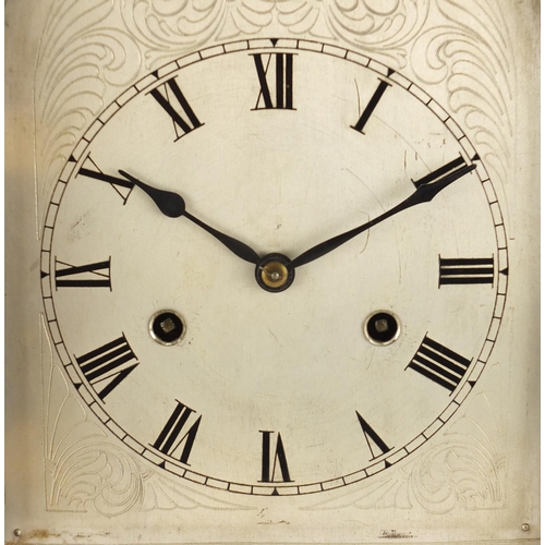 2140 - Inlaid mahogany striking mantle clock, with silvered dial and Roman numerals, 42.5cm high