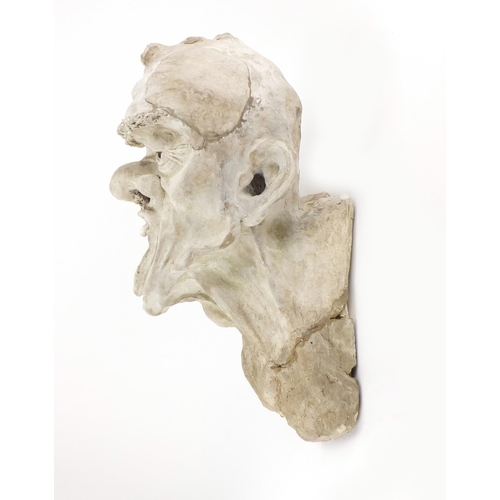 2146 - Grotesque stoneware bust of a man, 46cm high