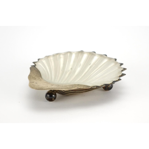 2248 - Silver shell shaped salt with glass liner and ball feet, by Goldsmiths and Silversmiths Company Shef... 