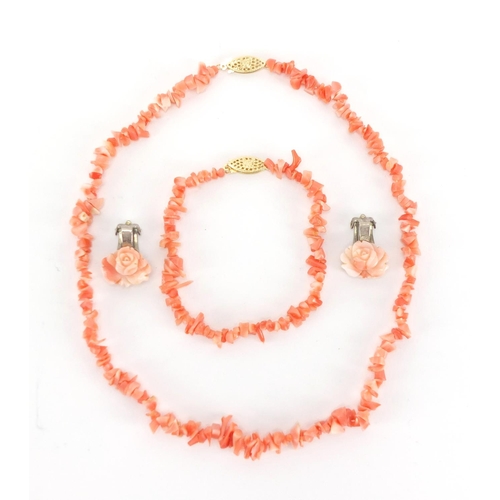 2369 - Natural pink coral necklace and bracelet with 9ct gold clasps and a pair of similar earrings, approx... 