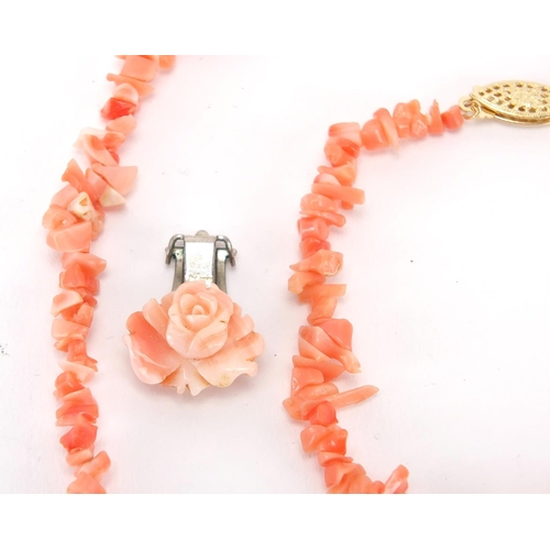 2369 - Natural pink coral necklace and bracelet with 9ct gold clasps and a pair of similar earrings, approx... 