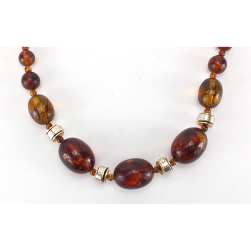 246 - Amber coloured bead necklace, 72cm in length, approximate weight 81.5g
