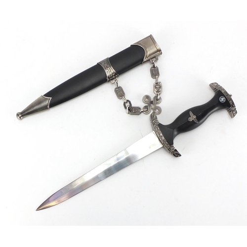 626 - German style Military interest dagger with scabbard, 39cm in length