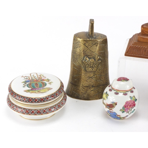 382 - Objects including a Chinese jewellery box carved with a dragon, brass cow bell and jars and covers