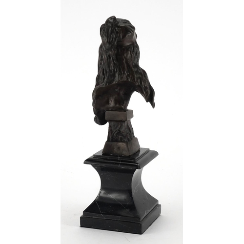 2045 - Patinated bronze bust of an Art Nouveau female, raised on a black marble base, 29cm high