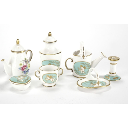 2142 - Miniature Spode including watering cans, teapot and coffee pot, the largest 6.8cm high