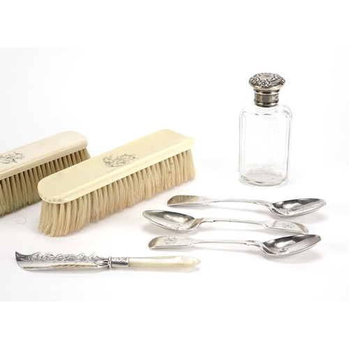 2252 - Three ivory backed brushes and a group of silver items including a cut glass bottle