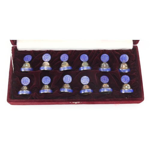 2243 - Set of twelve Korean silver and enamel place card holders, with certificate and velvet lined fitted ... 