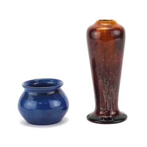 508 - Two Arts & Crafts art pottery vases comprising Ashby Guild pottery and Liberty, both with impressed ... 