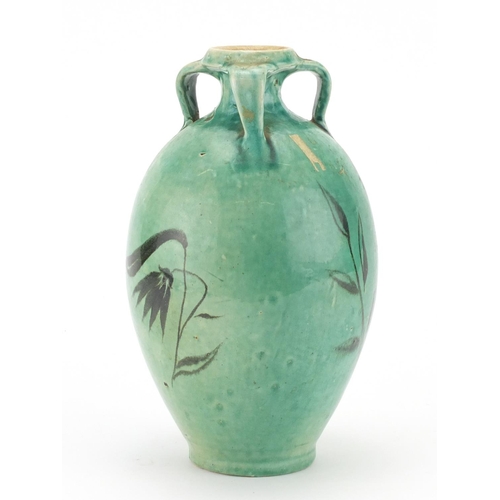 310 - Korean celadon glazed pottery vase with three handles, hand painted with leaves, 22cm high
