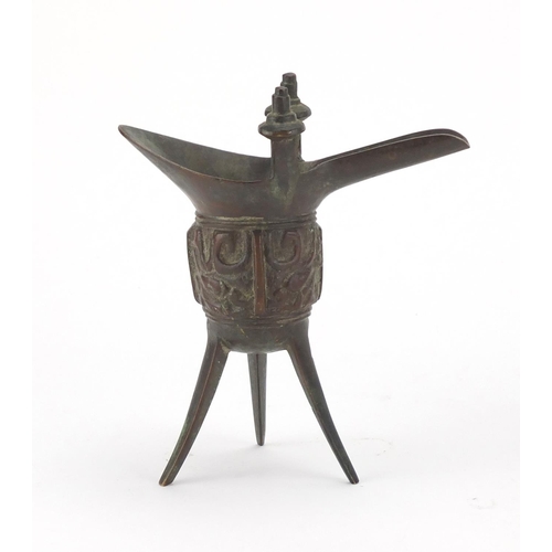 331 - Chinese patinated bronze tripod wine cup and a cloisonné opium pipe, the largest 26.5cm high