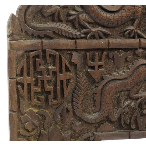 362 - Chinese hardwood three fold table screen, profusely carved with dragons, 62cm H x 84cm W