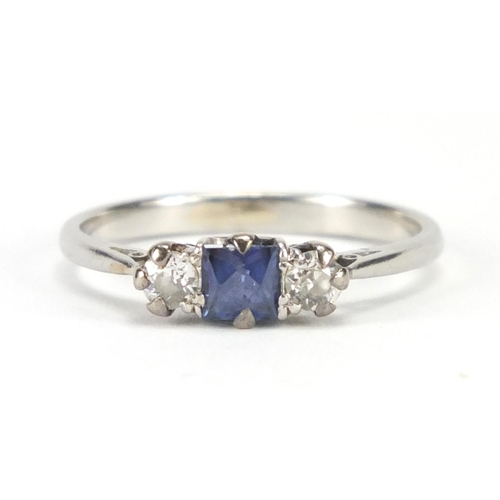 714 - Unmarked platinum sapphire and diamond three stone ring, size N, approximate weight 3.0g