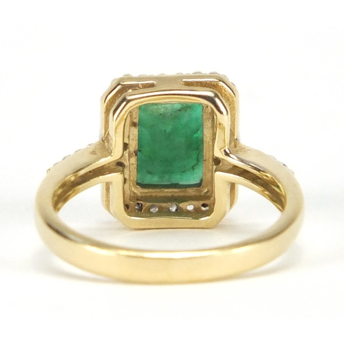 704 - 9ct gold emerald and diamond ring, size J, approximate weight 3.0g