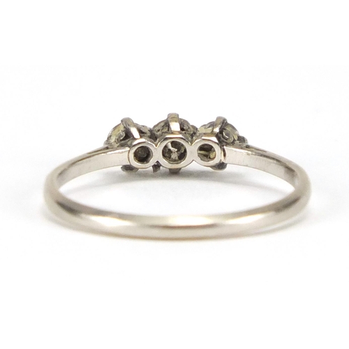 732 - Unmarked platinum and diamond three stone ring, size O, approximate weight 2.3g