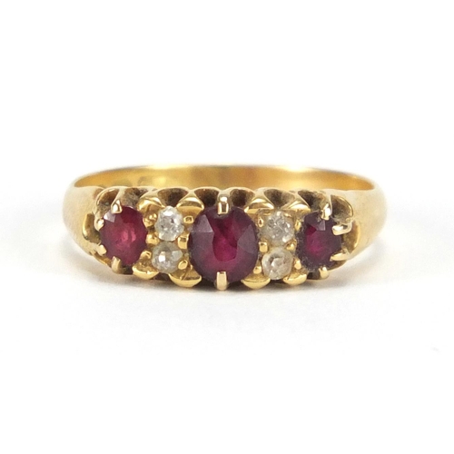 719 - Victorian 18ct gold ruby and diamond ring, Birmingham 1897, size M, approximate weight 3.1g, housed ... 