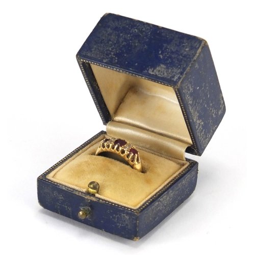 719 - Victorian 18ct gold ruby and diamond ring, Birmingham 1897, size M, approximate weight 3.1g, housed ... 