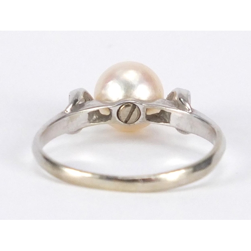 729 - 18ct white gold pearl and diamond ring, size M, approximate weight 2.5g