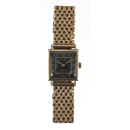 793 - Gentleman's 9ct gold dress watch with 9ct gold strap, the dial marked Bravingtons London, the face 2... 