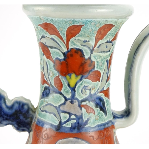 296 - Chinese porcelain wine vessel, hand painted with flower heads amongst foliate scrolls, 34cm high