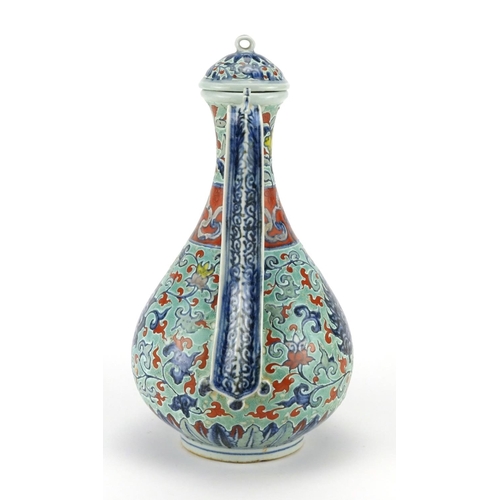 296 - Chinese porcelain wine vessel, hand painted with flower heads amongst foliate scrolls, 34cm high