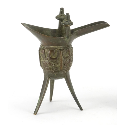 331 - Chinese patinated bronze tripod wine cup and a cloisonné opium pipe, the largest 26.5cm high