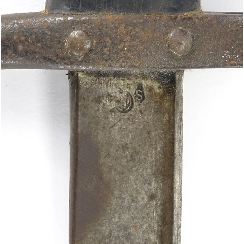 233 - French Military interest bayonet with scabbard, impressed marks to the blade, 66cm in length