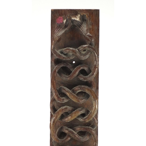 420 - Pair of African carved wood figural bookends and a carved wood panel of mermaids, 65cm in length