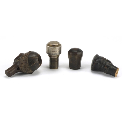 498 - Objects including a horn walking stick handle, silver mounted wick and two carved wood bust stoppers