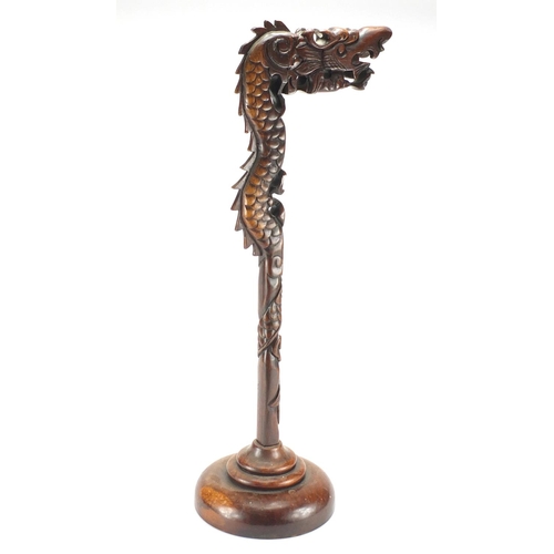 631 - Chinese carved hardwood dragon gong stand, 65cm high