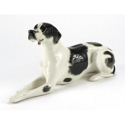 77 - Russian china USSR recumbent black and white Great Dane, 29.5cm in length