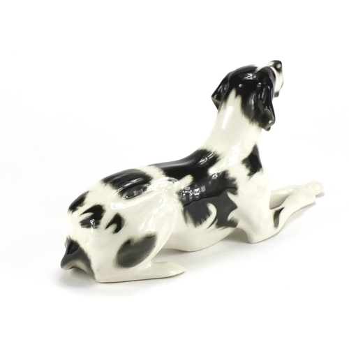 77 - Russian china USSR recumbent black and white Great Dane, 29.5cm in length