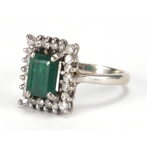 678 - 18ct white gold emerald and diamond ring, size M, approximate weight 4.9g