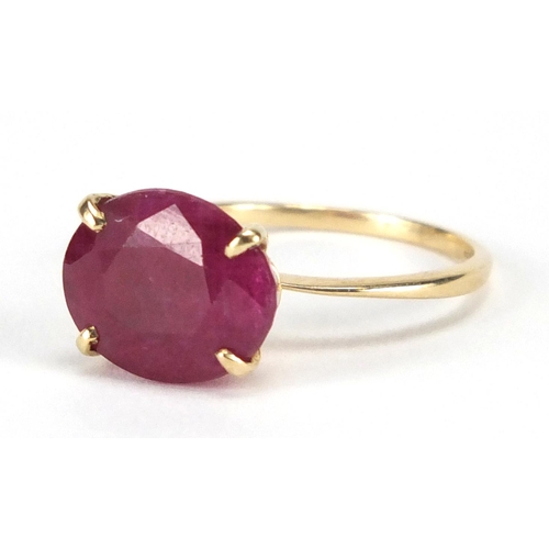 743 - 10ct gold ruby solitaire ring, impressed marks T G G C. size L, approximate weight 2.8g