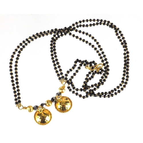 748 - Indian 22ct gold, diamond and black bead Mangalsutra marriage necklace, 62cm in length, approximate ... 