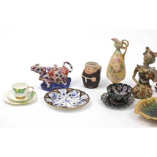 558 - China including a Paragon hand painted trio, Imari pattern cow creamer, Goebel monk and Majolica lea... 