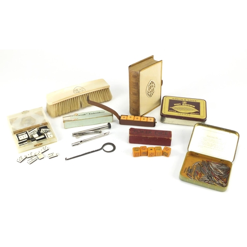 436 - Objects including ivory backed brush, dominoes, dice and vintage advertising tins