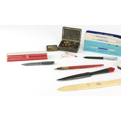 435 - Objects including an ivory letter opener, Parker 61 pen box, fountain pen nibs and ballpoint pens
