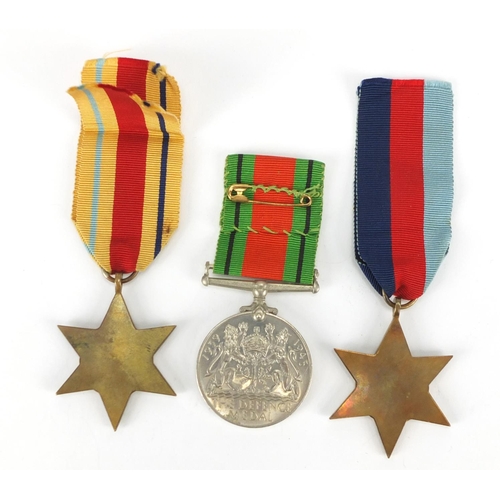 740 - Three British Military World War II medals with ribbons