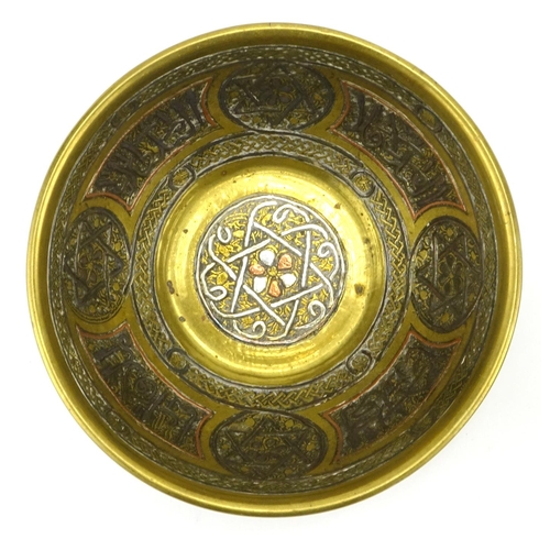 399 - Two Cairoware brass bowls, with copper and silver inlay decorated with script and star motifs, the l... 