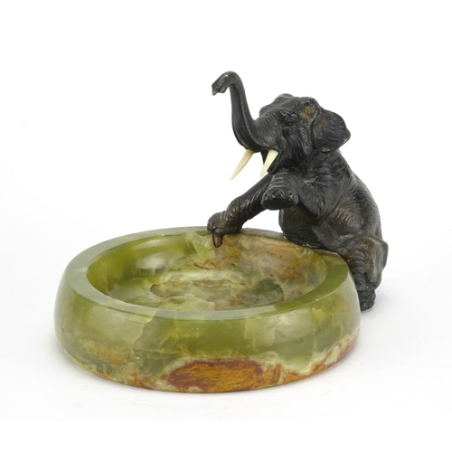 546 - Art Deco patinated bronze and onyx elephant design dish, 14.5cm high