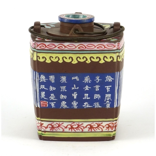 317 - Chinese yixing terracotta teapot enamelled with calligraphy and bamboo trees, 12cm high