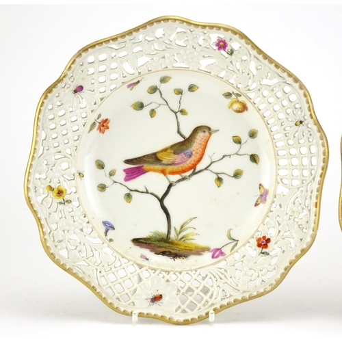 430 - Pair of Meissen porcelain plates with pierced borders, hand painted with birds and insects, cross sw... 