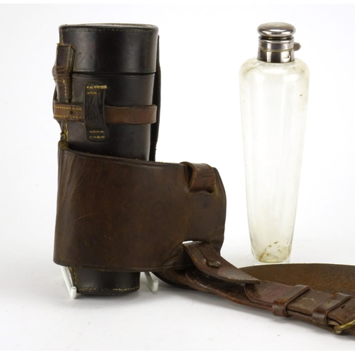 78 - Early 20th Century glass saddle flask with silver plated mounts and leather case, the silver plated ... 