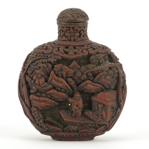 345 - Chinese cinnabar lacquer snuff bottle, carved with figures in a landscape, 8.5cm high