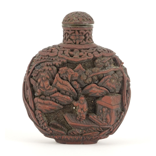 345 - Chinese cinnabar lacquer snuff bottle, carved with figures in a landscape, 8.5cm high