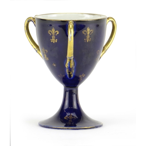 532 - Royal Vienna cobalt blue ground pedestal tyg decorated with a maiden, factory marks to the base, 12.... 